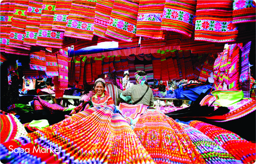 Colourful woven textiles at Sapa Market stall