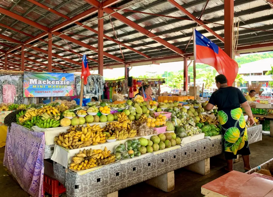 Colourful tropical fruit stall at a covered market