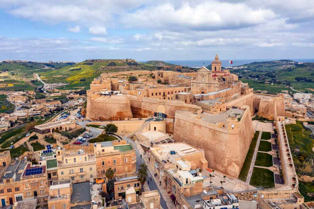 Hilltop fortified city with cathedral and bastions