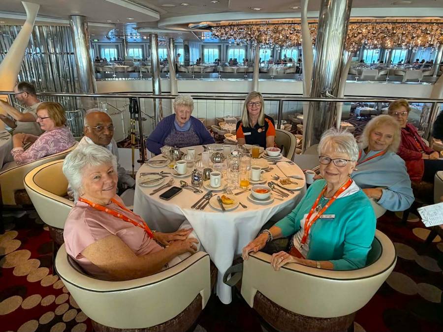 Group of seniors dining on cruise ship