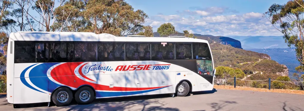 Tour bus at scenic mountain lookout