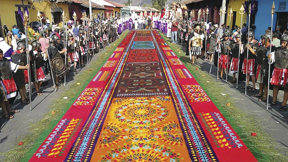 Colourful street carpet with Roman soldier procession